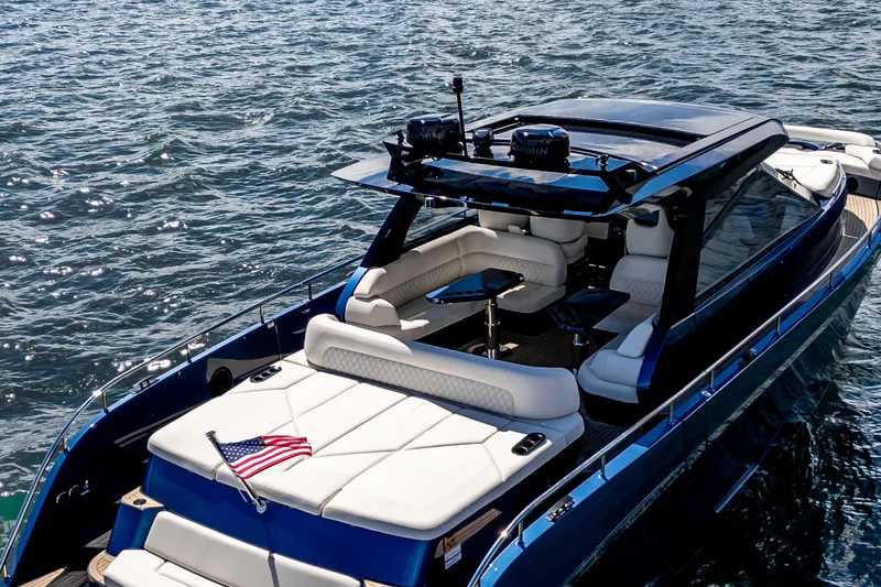 Slide: The Image of Luxurious 2025 Dutch American DA 53 yacht cruising on open water. - 9