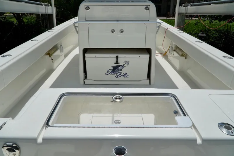 Slide: The Image of 2017 SeaVee 34Z boat interior with storage compartments and fishing gear. - 102