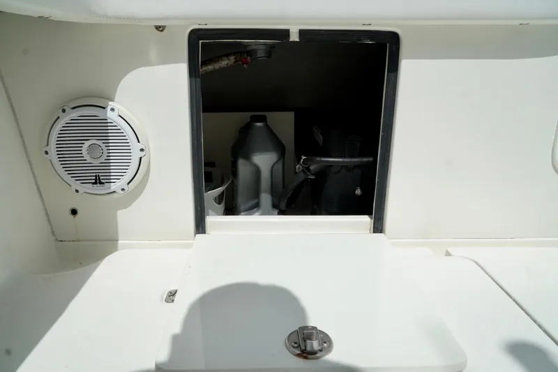 Slide: The Image of 2017 SeaVee 34Z boat storage compartment with speaker and equipment. - 20