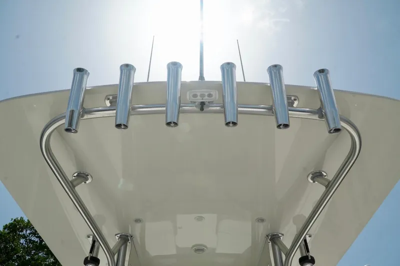 Slide: The Image of 2017 SeaVee 34Z boat with stainless steel rod holders under a clear sky. - 51