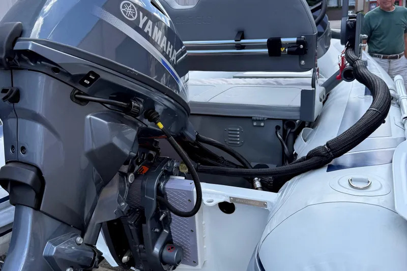 Slide: The Image of 2025 Highfield CL310 FCT boat with Yamaha outboard motor, detailed view. - 7