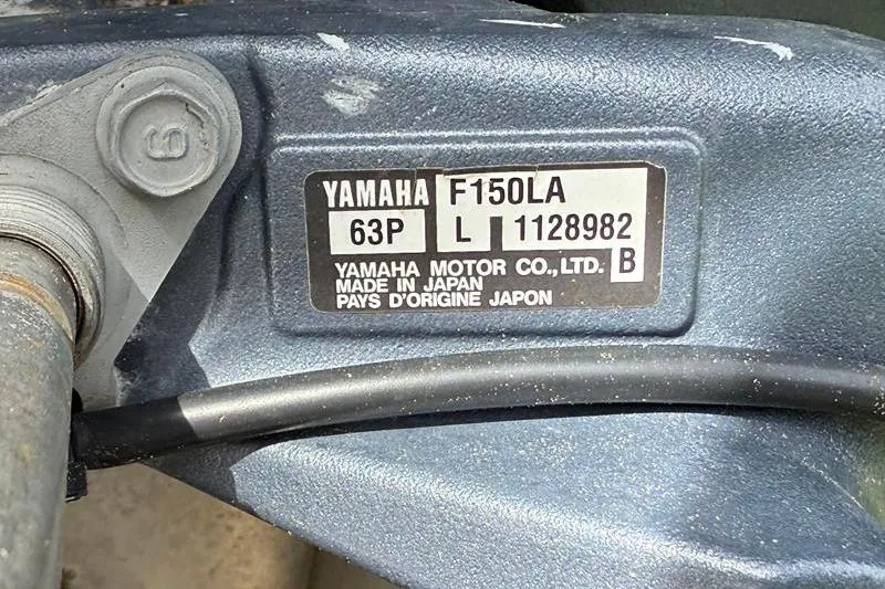 Slide: The Image of Yamaha F150LA engine label on 2013 Hewes Redfisher 18, made in Japan. - 17