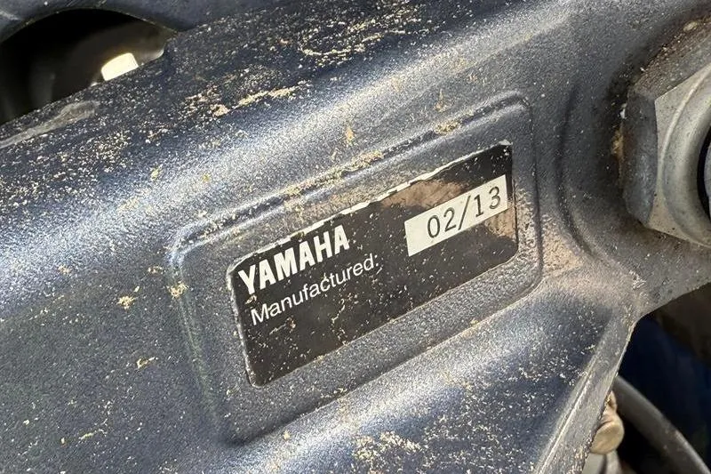 Slide: The Image of Yamaha engine label on 2013 Hewes Redfisher 18, manufactured February 2013. - 19