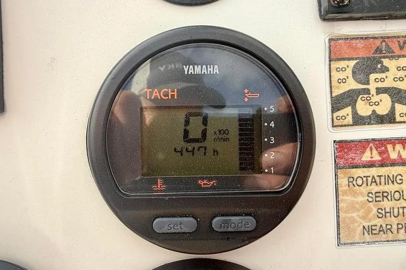 Slide: The Image of Yamaha tachometer displaying 447 hours on a 2013 Hewes Redfisher 18 boat. - 20