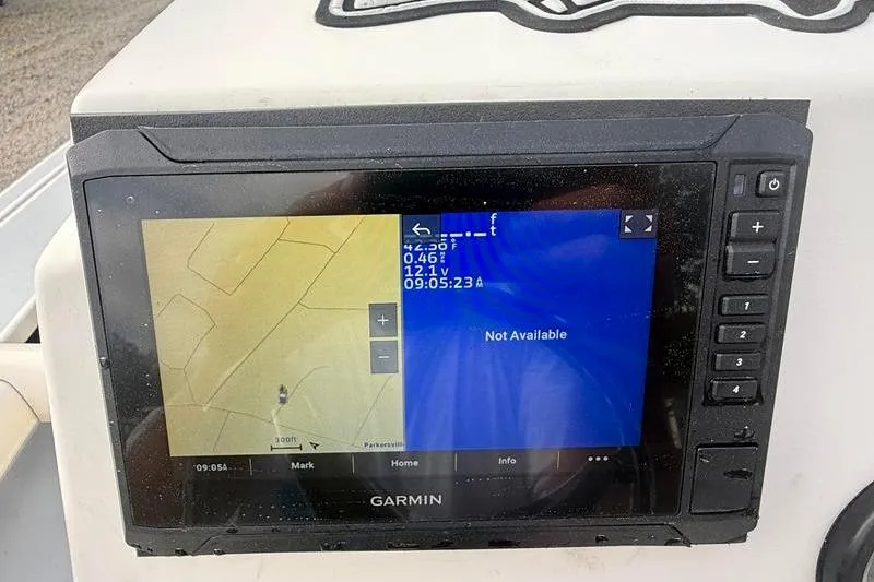 Slide: The Image of Garmin GPS display on 2013 Hewes Redfisher 18 boat, showing navigation map and data. - 21