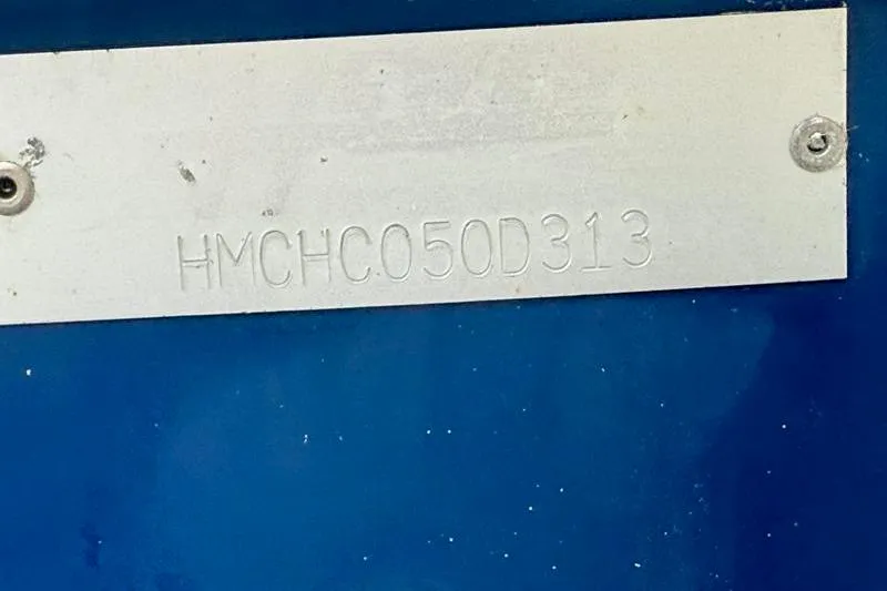 Slide: The Image of 2013 Hewes Redfisher 18 boat identification plate with serial number. - 24
