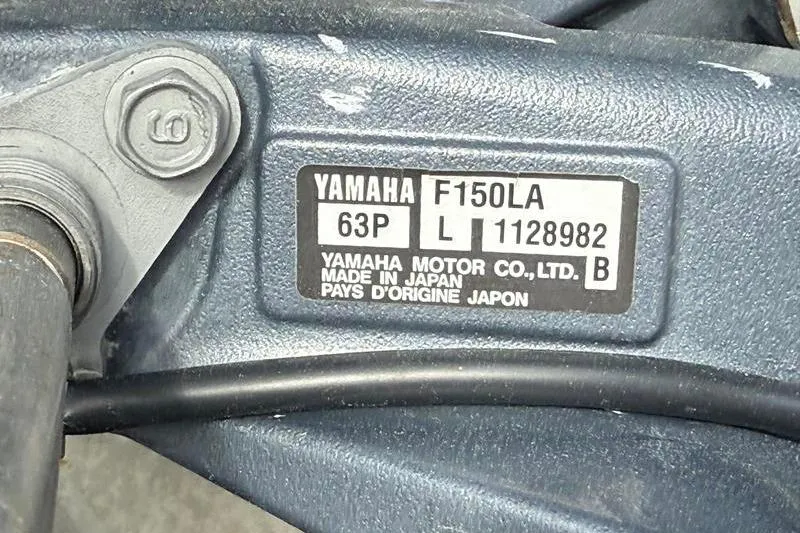 Slide: The Image of Yamaha F150LA engine label on 2013 Hewes Redfisher 18, made in Japan. - 25