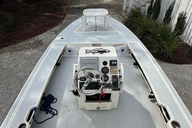 Slide: The Image of 2013 Hewes Redfisher 18 boat with Garmin navigation system and steering console. - 5
