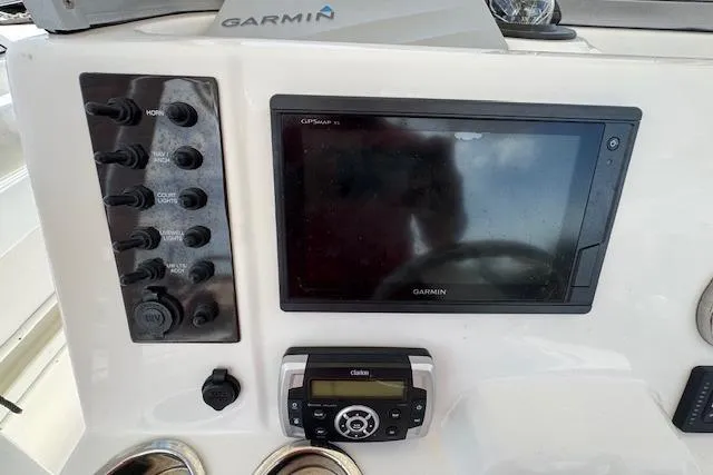 Slide: The Image of Control panel of 2018 Robalo R222 Explorer with Garmin navigation system. - 9