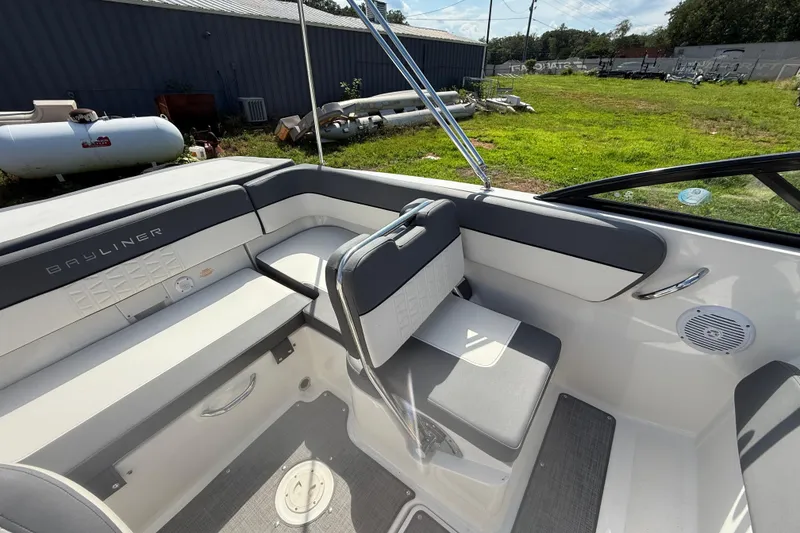 Slide: The Image of 2019 Bayliner VR5 Bowrider I/O interior with gray seating and modern design. - 7
