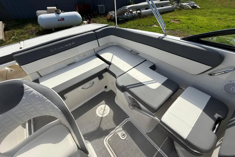 Slide: The Image of 2019 Bayliner VR5 Bowrider I/O interior with gray and white seating arrangement. - 9