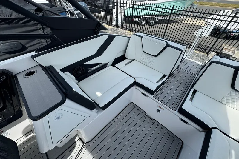 Slide: The Image of Manufacturer Provided Image: 2026 Yamaha Boats 252SD on water with people enjoying leisure time. - 16