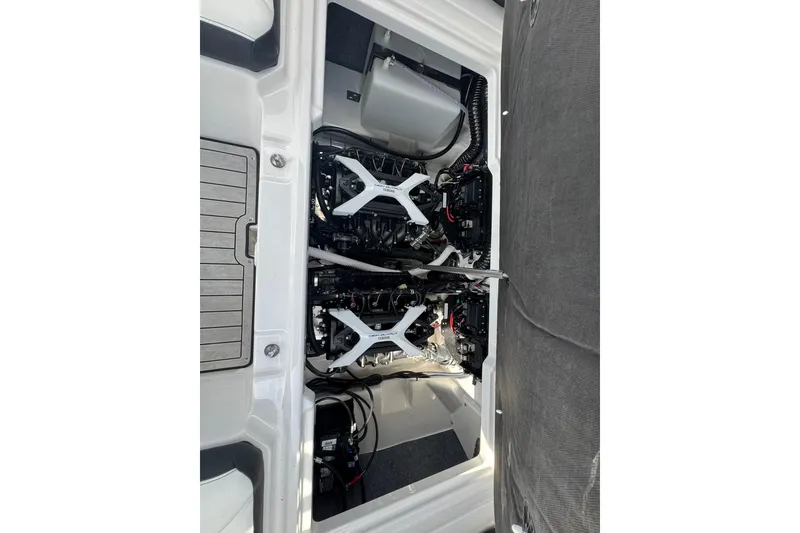 Slide: The Image of 2026 Yamaha Boats 252SD interior with sleek white seating and modern design. - 18