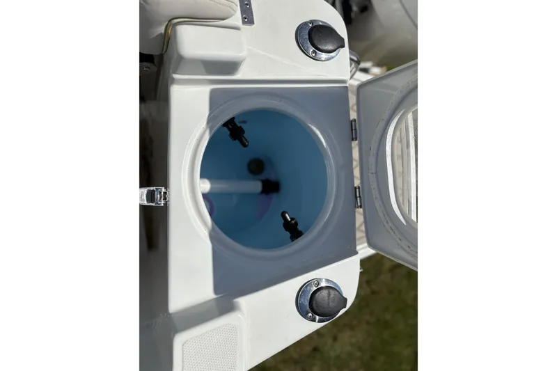 Slide: The Image of Open livewell on 2023 Finseeker 230cc boat, showcasing interior features. - 10
