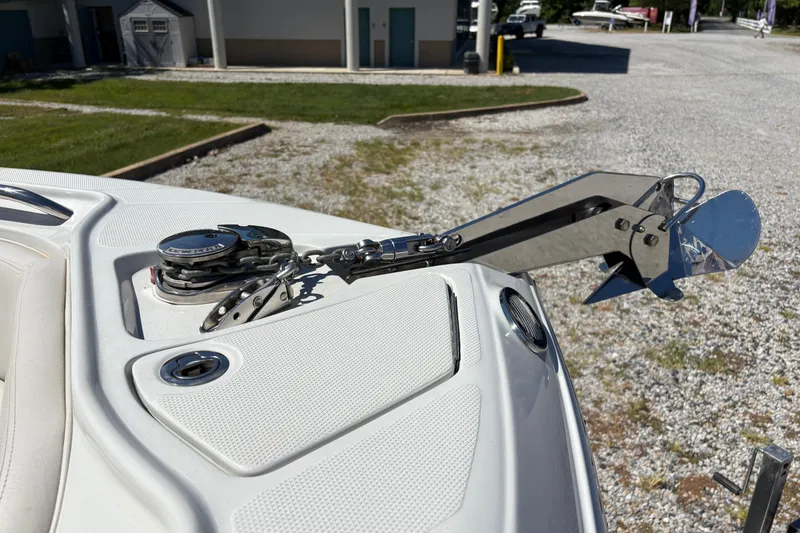 Slide: The Image of 2023 Finseeker 230cc boat anchor system on deck, featuring stainless steel components. - 19