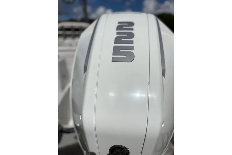 Slide: The Image of 2023 Finseeker 230cc boat engine close-up with "225" marking. - 8