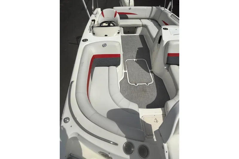 Slide: The Image of 2019 Hurricane SunDeck Sport 188 OB boat interior with gray and red seating. - 4