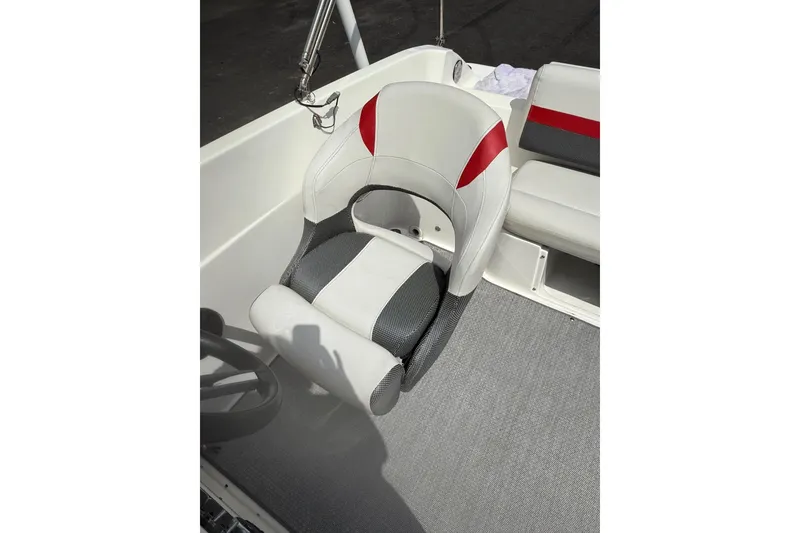 Slide: The Image of Captain's seat on 2019 Hurricane SunDeck Sport 188 OB boat, featuring red and gray accents. - 9
