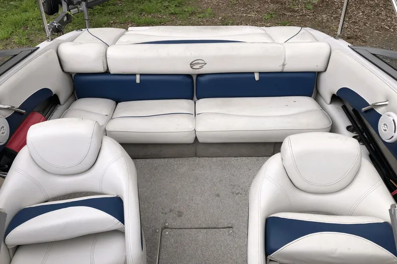 Slide: The Image of 2008 Crownline 19 SS boat interior with white and blue seating. - 22