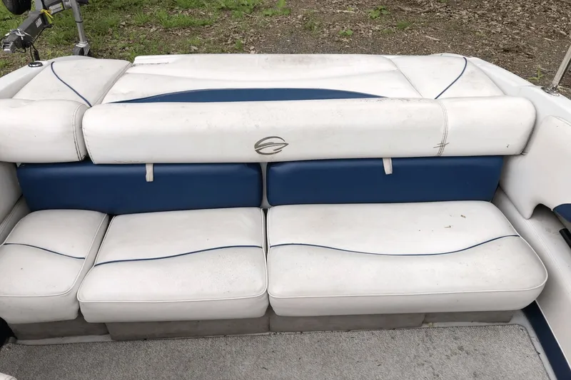 Slide: The Image of 2008 Crownline 19 SS boat interior with white and blue seating. - 23
