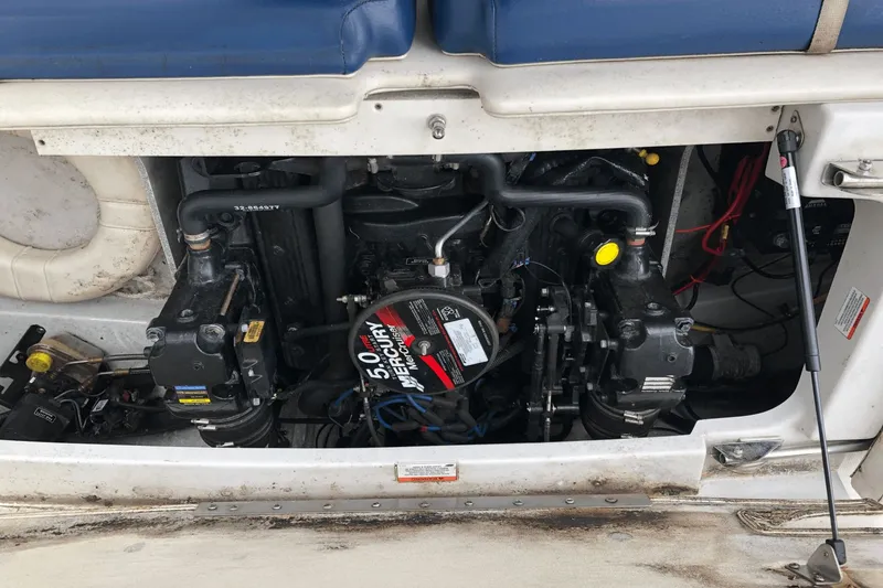 Slide: The Image of 2008 Crownline 19 SS boat engine compartment with Mercury 5.0 engine visible. - 30