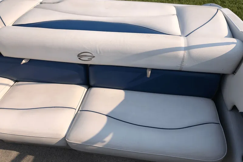 Slide: The Image of 2008 Crownline 19 SS boat seating with white and blue upholstery. - 5