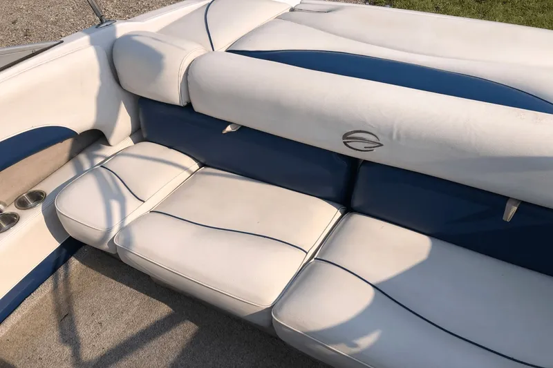 Slide: The Image of 2008 Crownline 19 SS boat interior with white and blue seating. - 6