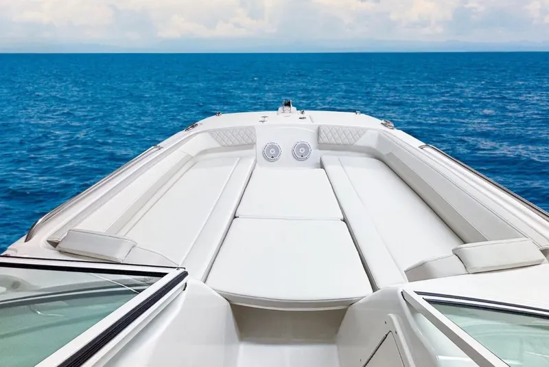 Slide: The Image of 2026 World Cat 230 DC boat with spacious deck on open sea. - 8