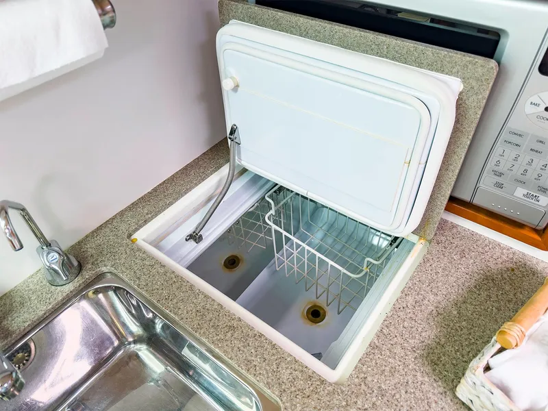 Slide: The Image of 2012 MJM 40z Downeast boat galley with sink and built-in cooler. - 29