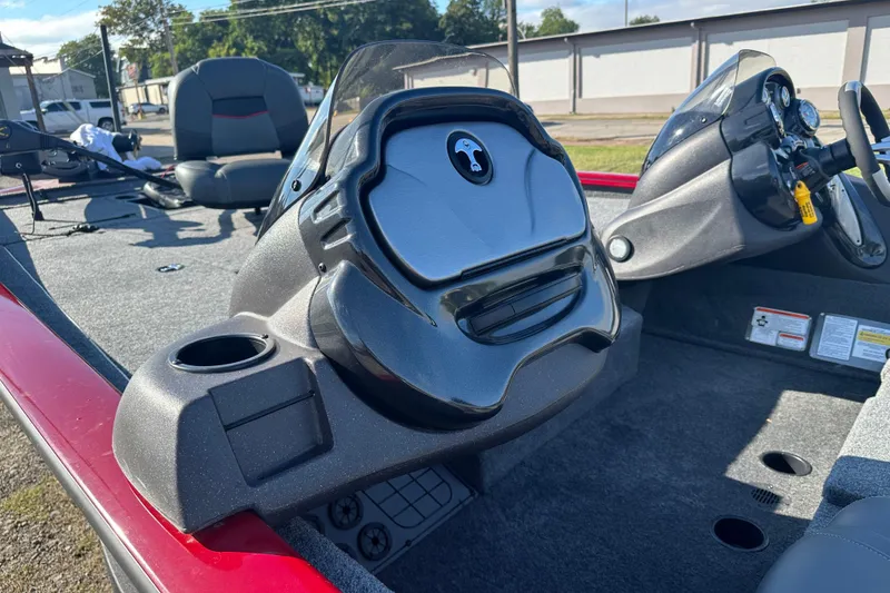 Slide: The Image of 2024 Tracker Pro Team 195 TXW Tournament Edition boat interior with steering console. - 11