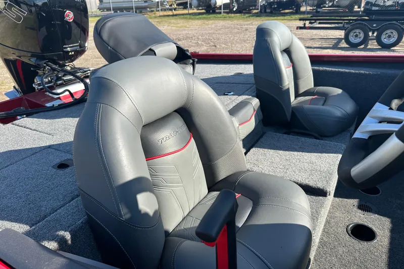 Slide: The Image of 2024 Tracker Pro Team 195 TXW Tournament Edition boat interior with gray seating. - 15