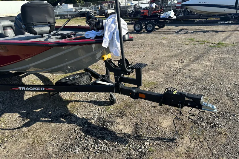 Slide: The Image of 2024 Tracker Pro Team 195 TXW Tournament Edition boat on trailer in outdoor setting. - 5