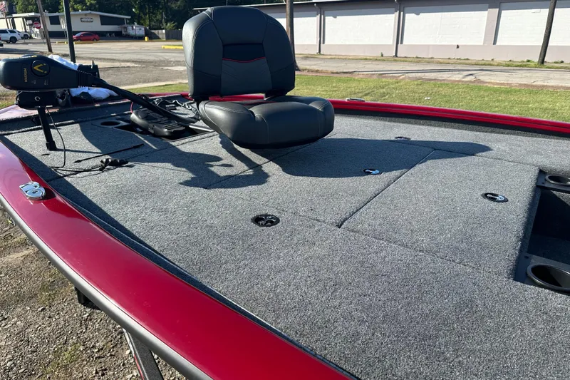 Slide: The Image of 2024 Tracker Pro Team 195 TXW Tournament Edition boat with gray deck and seating. - 8