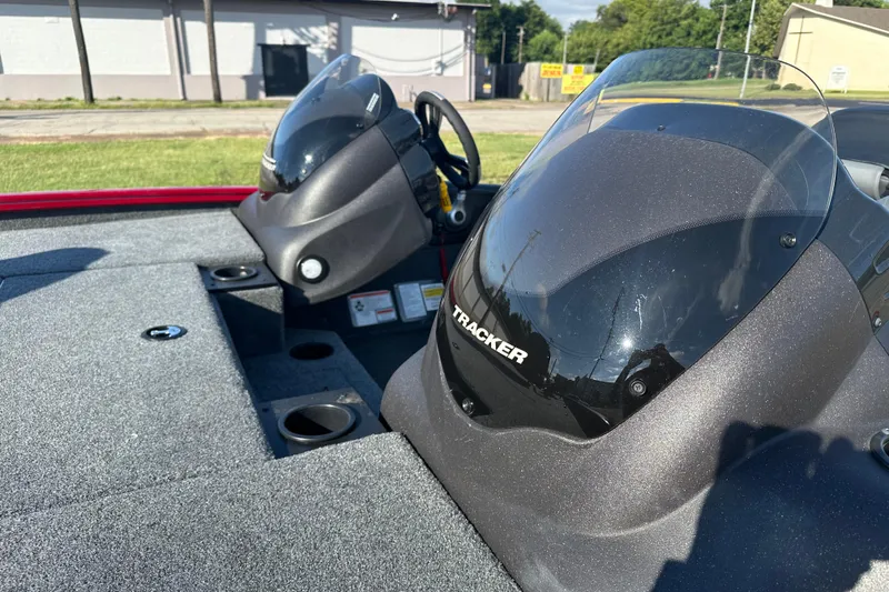 Slide: The Image of 2024 Tracker Pro Team 195 TXW Tournament Edition boat interior with dual consoles. - 9