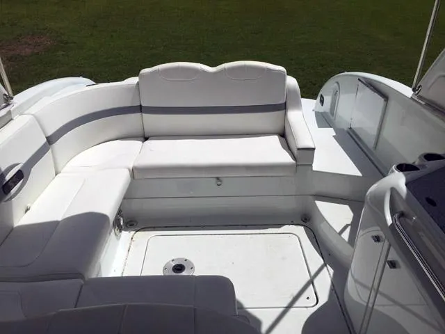 Slide: The Image of 2008 Formula 310 Sun Sport boat interior with white seating and spacious layout. - 17