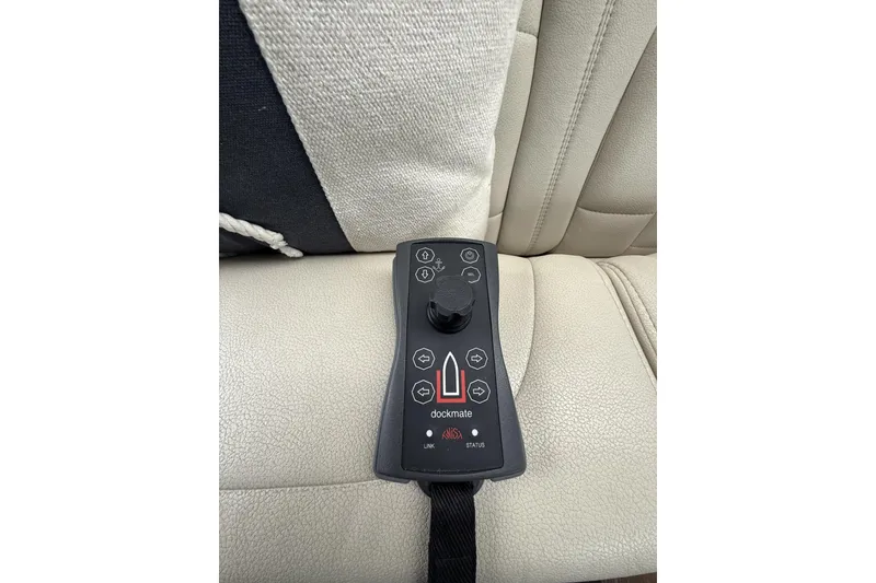 Slide: The Image of Remote control on Sea Ray Sundancer 460 yacht's beige leather seat, 2018 model. - 30