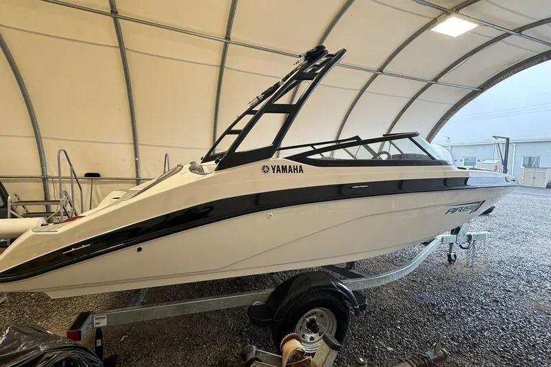 Slide: The Image of 2026 Yamaha Boats AR190 in a covered storage area, showcasing sleek design and modern features. - 4
