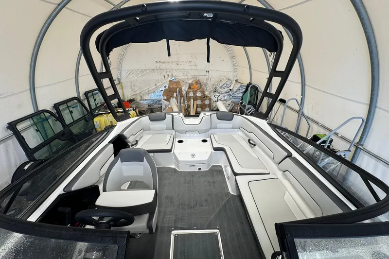 Slide: The Image of 2026 Yamaha Boats AR190 in a covered storage area, showcasing sleek design and modern features. - 6