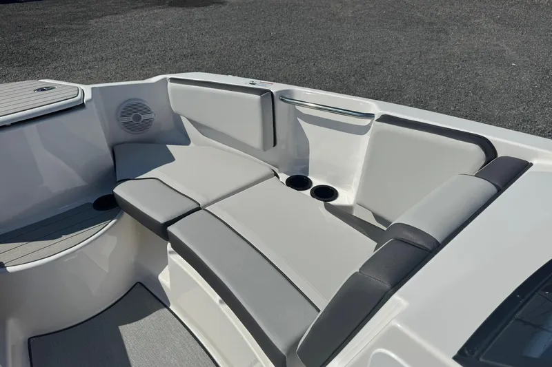 Slide: The Image of 2026 Yamaha Boats AR220 interior with sleek seating and modern design. - 14