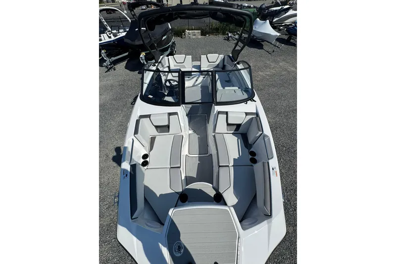 Slide: The Image of 2026 Yamaha Boats AR220 interior with sleek seating and modern design. - 24