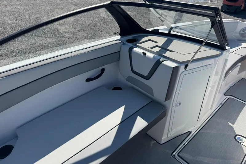 Slide: The Image of 2026 Yamaha Boats AR220 on trailer, rear view, sunny day. - 7