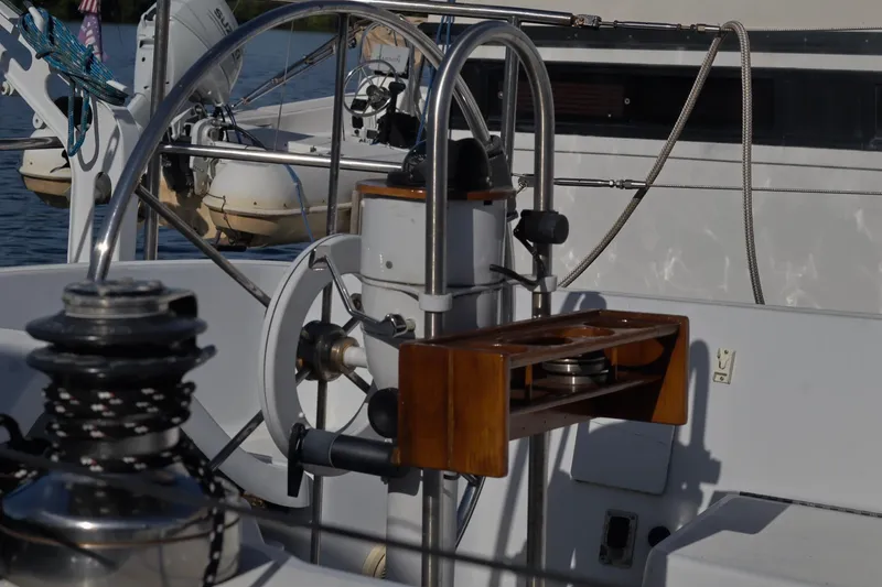 Slide: The Image of Cockpit of 1980 C&C Landfall 38 sailboat with steering wheel and winch. - 12
