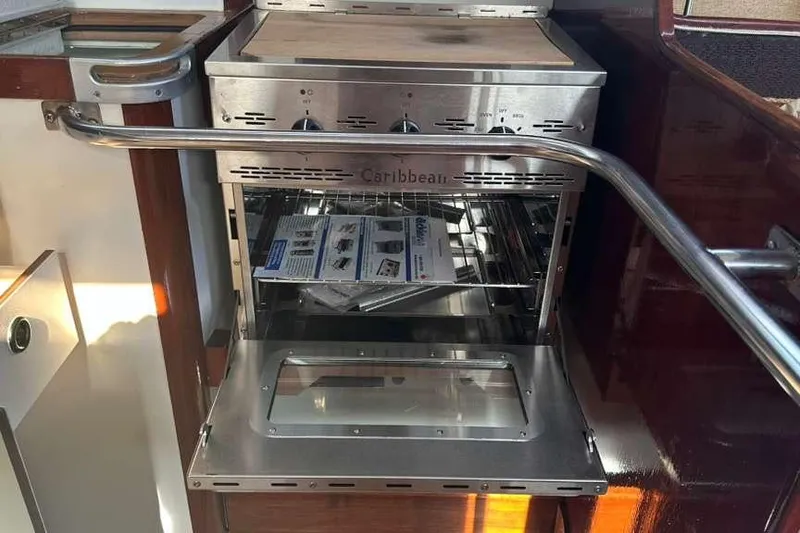 Slide: The Image of Stainless steel oven in 1980 C&C Landfall 38 yacht galley. - 33