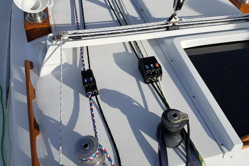 Slide: The Image of Deck of 1980 C&C Landfall 38 sailboat with winches and ropes. - 5