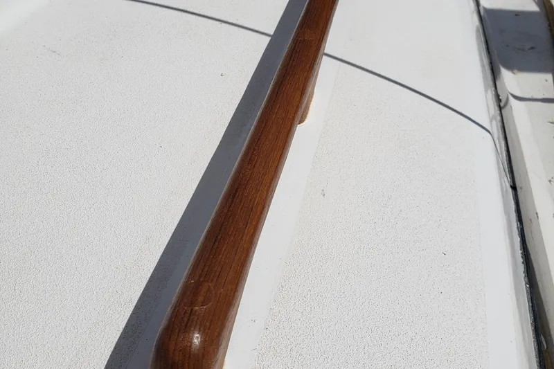 Slide: The Image of Wooden handrail on deck of 1980 C&C Landfall 38 sailboat. - 6