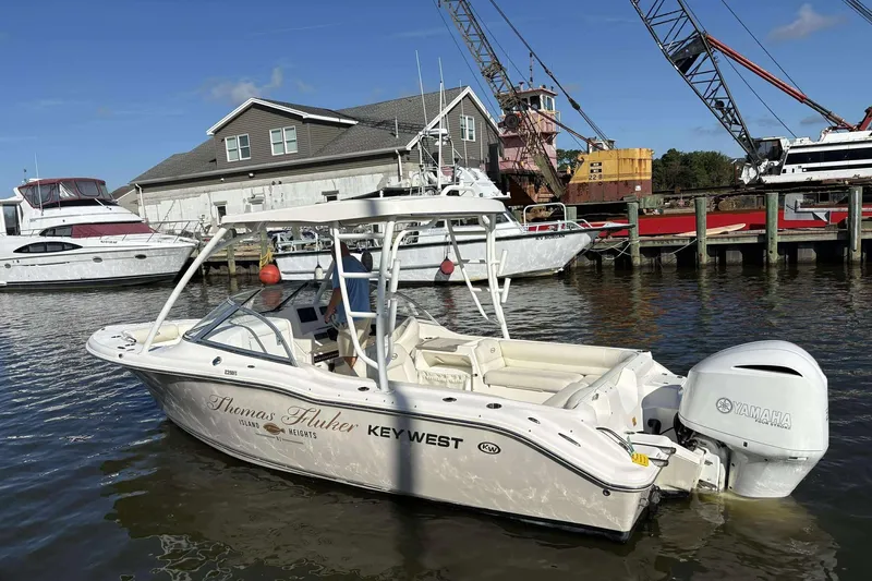 Slide: The Image of 2020 Key West 239 DFS boat docked at marina with Yamaha engine. - 4