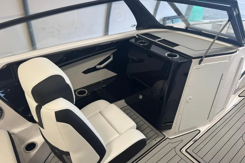 Slide: The Image of 2026 Yamaha Boats 222SD cockpit with modern steering and digital display. - 8