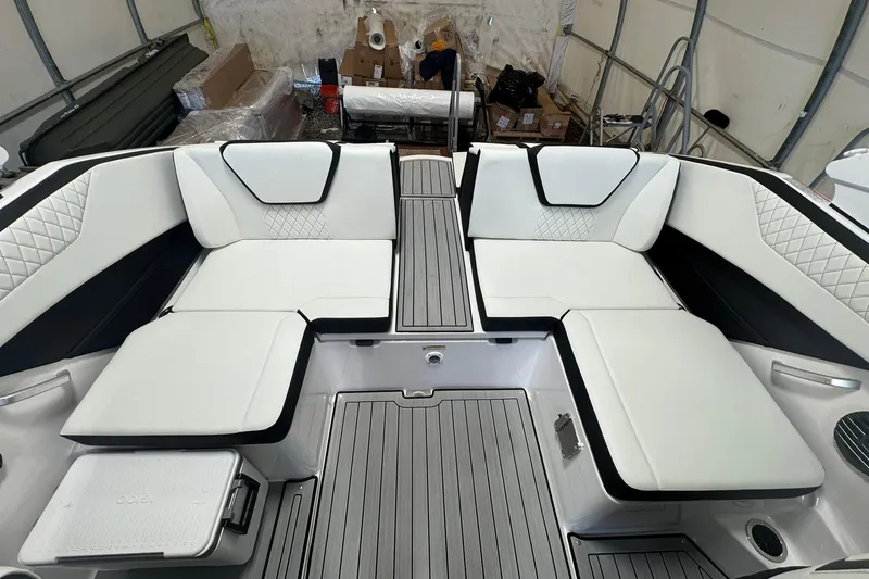 Slide: The Image of 2026 Yamaha Boats 222SD interior with sleek seating and modern dashboard design. - 9