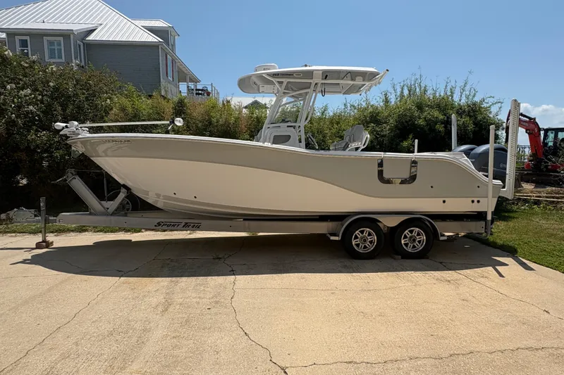 The Image of 2021 Sea Fox 268 Commander boat on trailer, parked outdoors. - 0