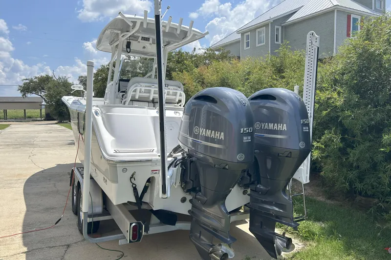 Slide: The Image of 2021 Sea Fox 268 Commander boat with dual Yamaha 150 engines on a trailer. - 11